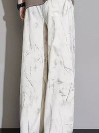 Men's Loose Fit Casual Pants featuring a stylish marble design and relaxed silhouette.