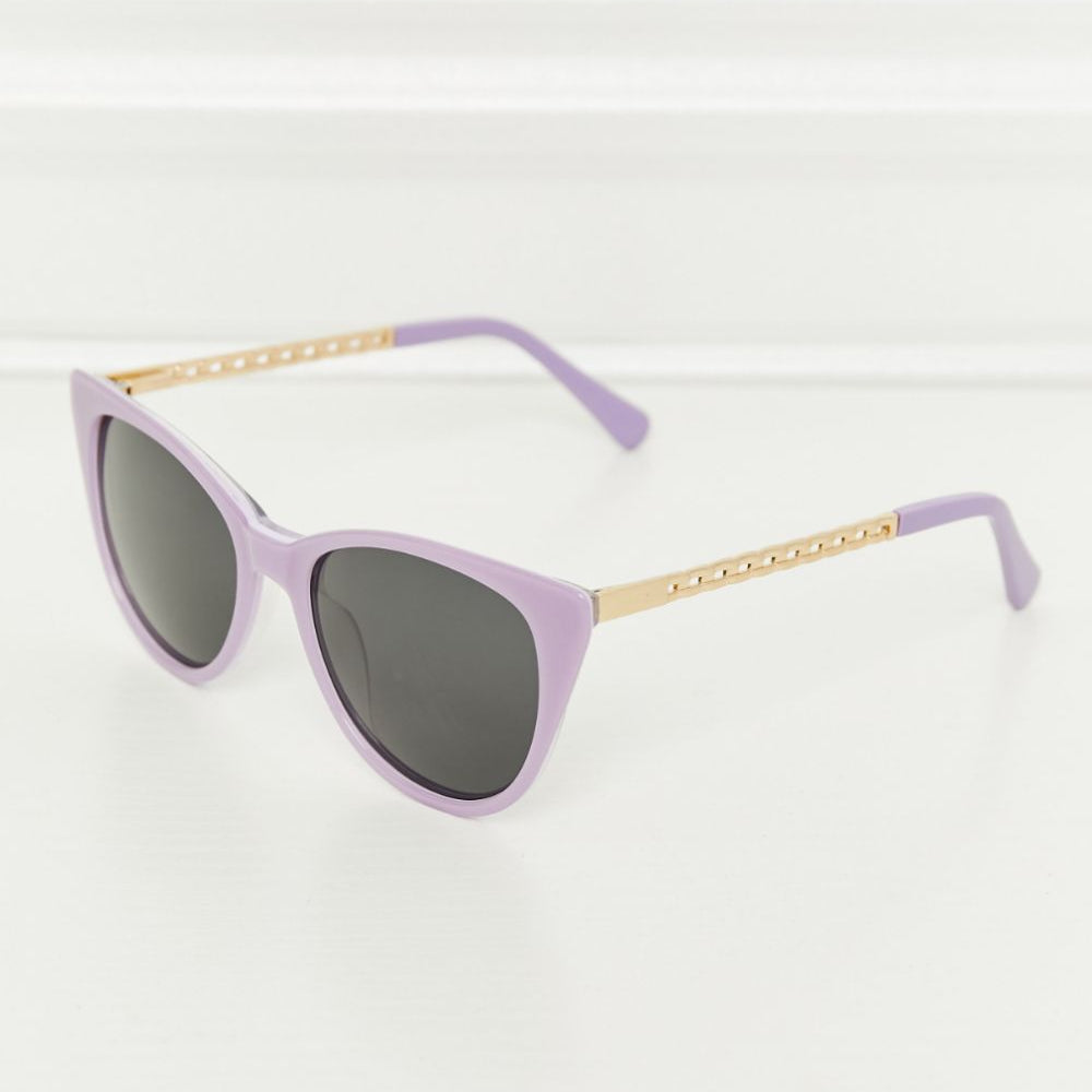 Cat-Eye Acetate Frame Sunglasses in lavender with metal temples and dark lenses.