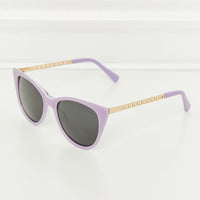 Cat-Eye Acetate Frame Sunglasses in lavender with metal temples and dark lenses.