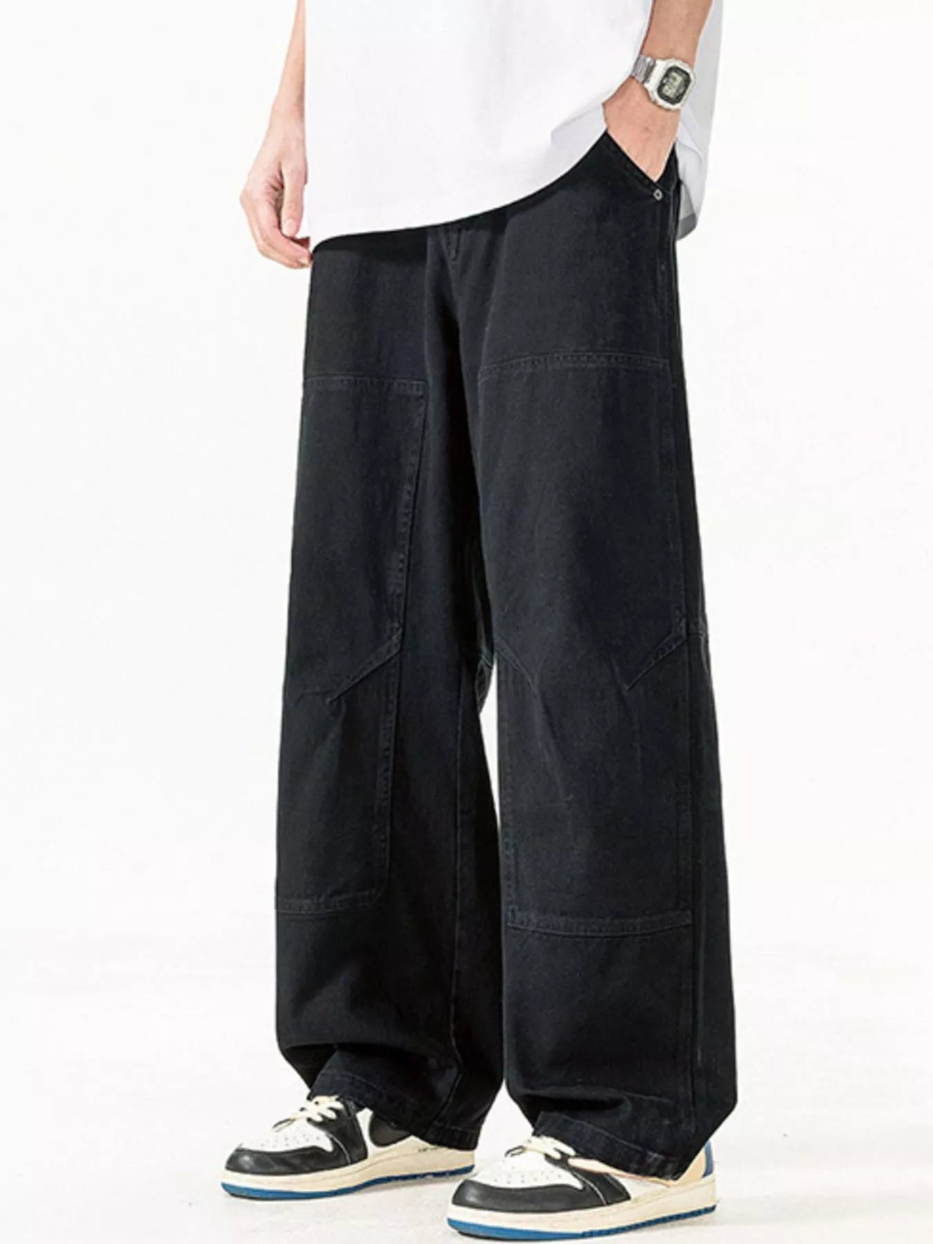 Men's Plus Size Loose Fit Casual Pants in black, featuring a comfortable relaxed style and pockets, perfect for casual wear.