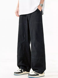 Men's Plus Size Loose Fit Casual Pants in black, featuring a comfortable relaxed style and pockets, perfect for casual wear.