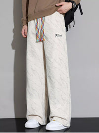 Men's Wide Leg Casual Pants featuring a drawstring, marble design, and stylish fit for comfort and casual wear.