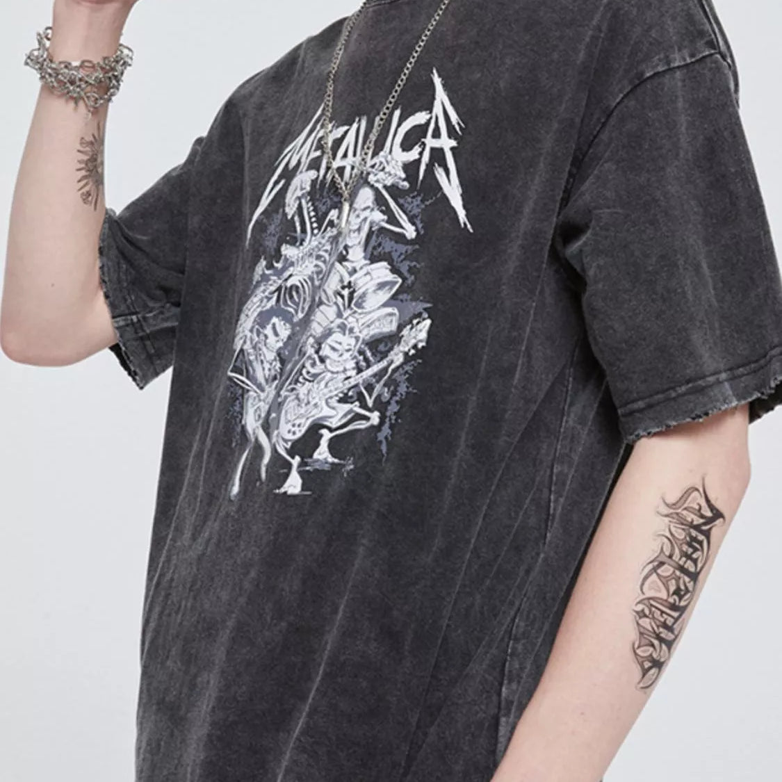 Men's Graphic METALLICA Round Neck Wash T-Shirt displayed on a model in a casual pose.