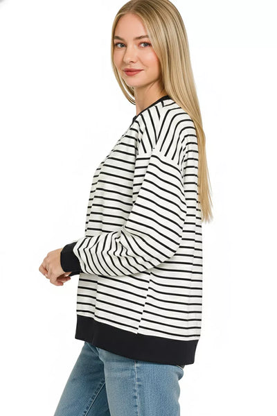 Zenana Contrast Striped Round Neck Sweatshirt in black and white stripes, featuring a sporty design with round neck.