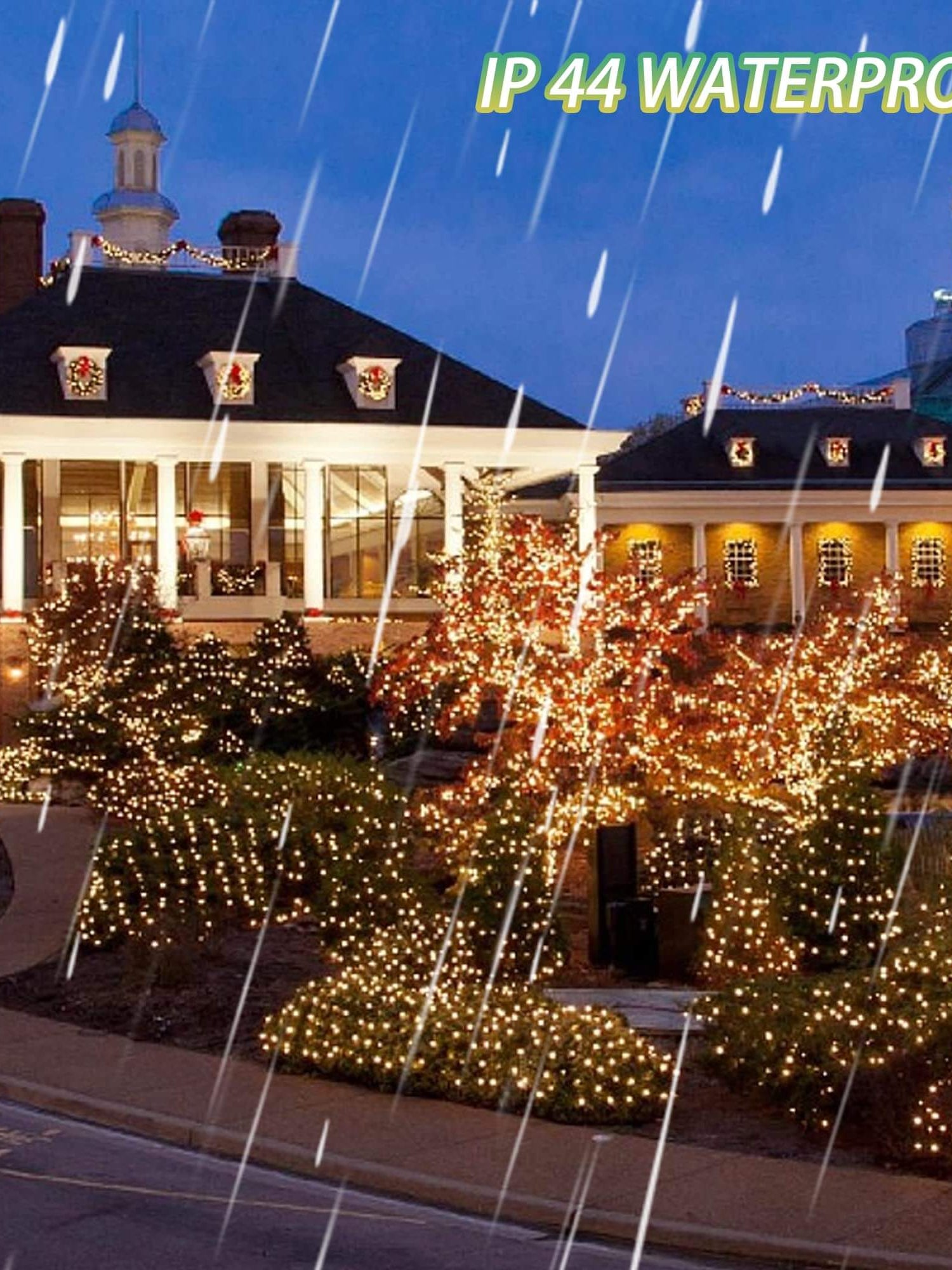 Beautifully illuminated building with waterproof LED string lights during rain, creating a festive atmosphere.