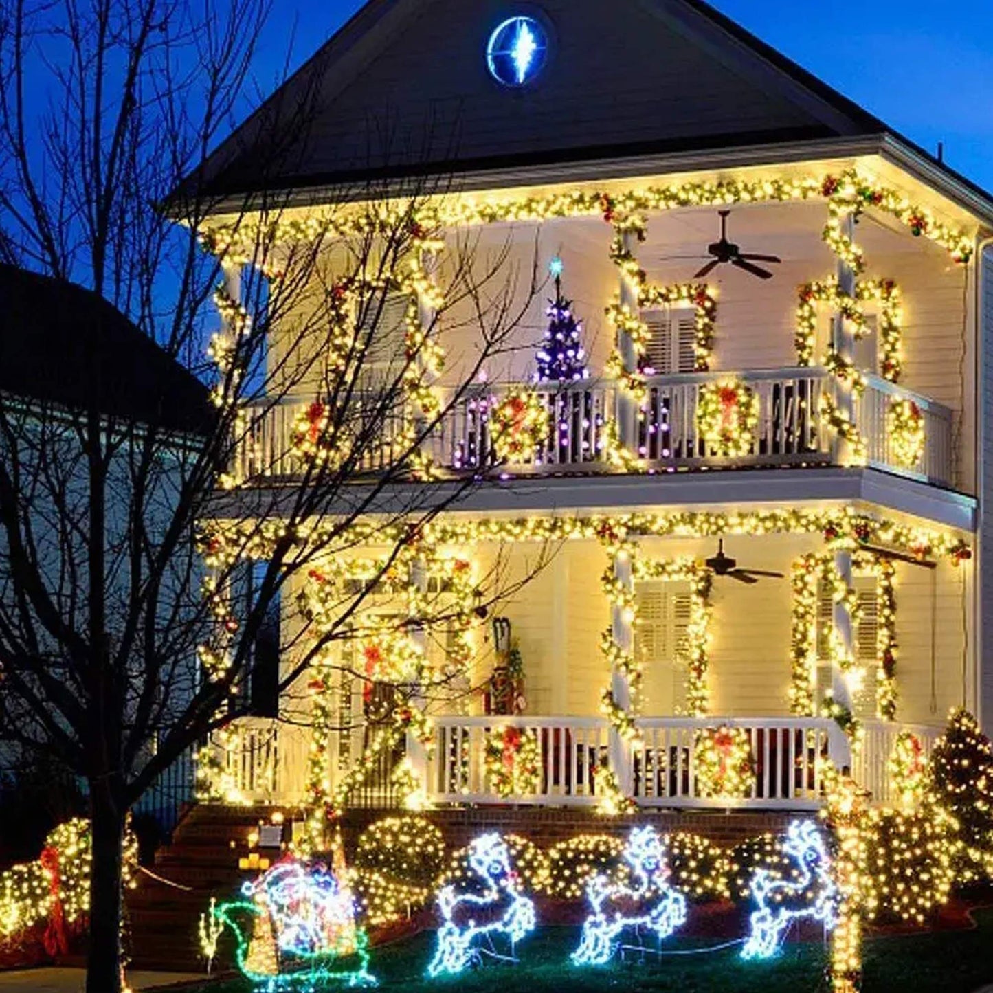 Beautifully decorated house with Christmas lights, wreaths, and a purple tree for festive holiday ambiance.