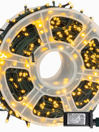 FUNPENY 164FT warm white LED string lights on a spool with green wire, perfect for indoor and outdoor festive decorations.