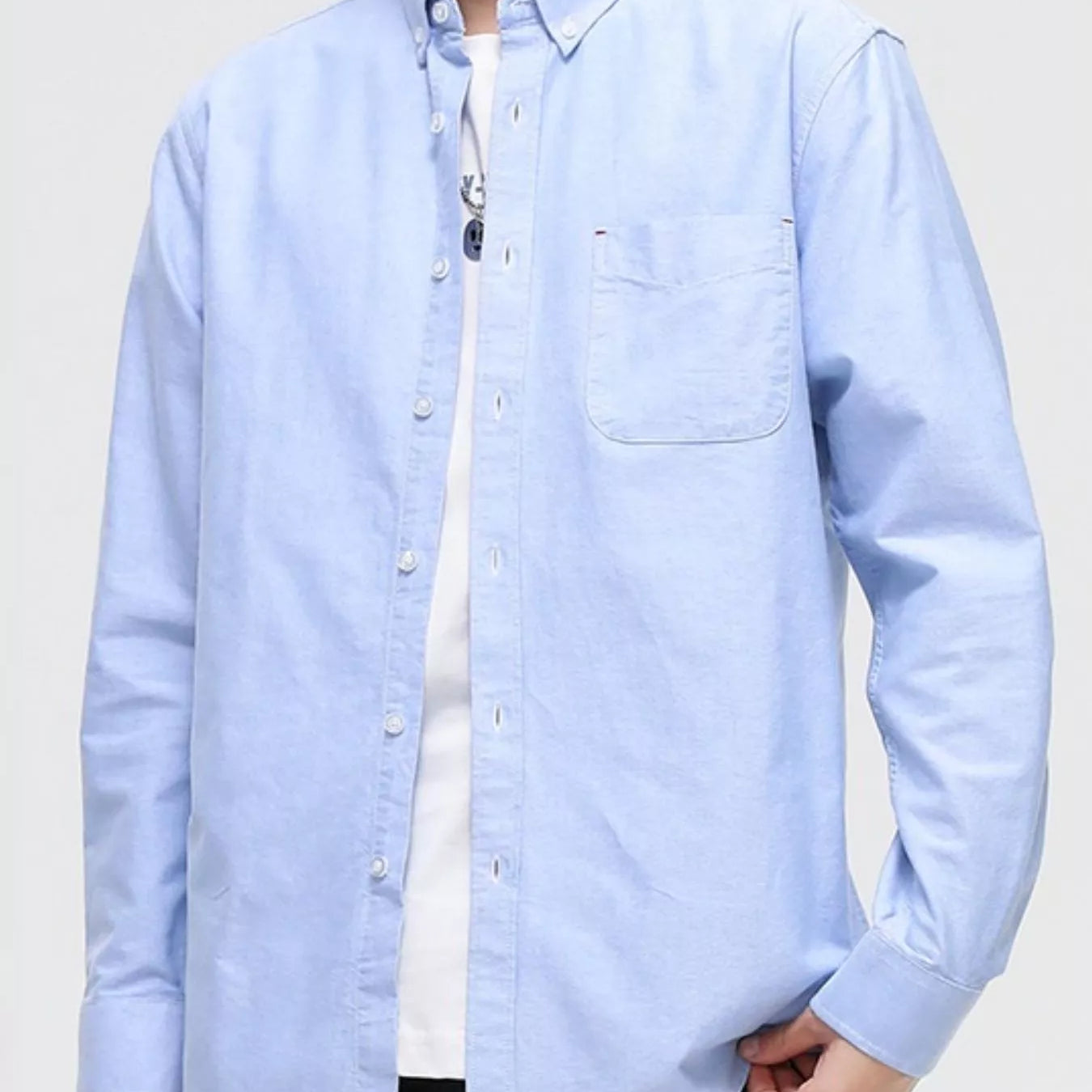 Men's Full Size Button Up Long Sleeve Shirt Plus Size in light blue with pocket, buttoned front, and classic collar.