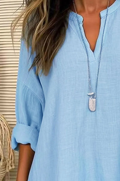 Solid Color Notched Long Sleeve Blouse in light blue with a stylish collar and rolled sleeves.