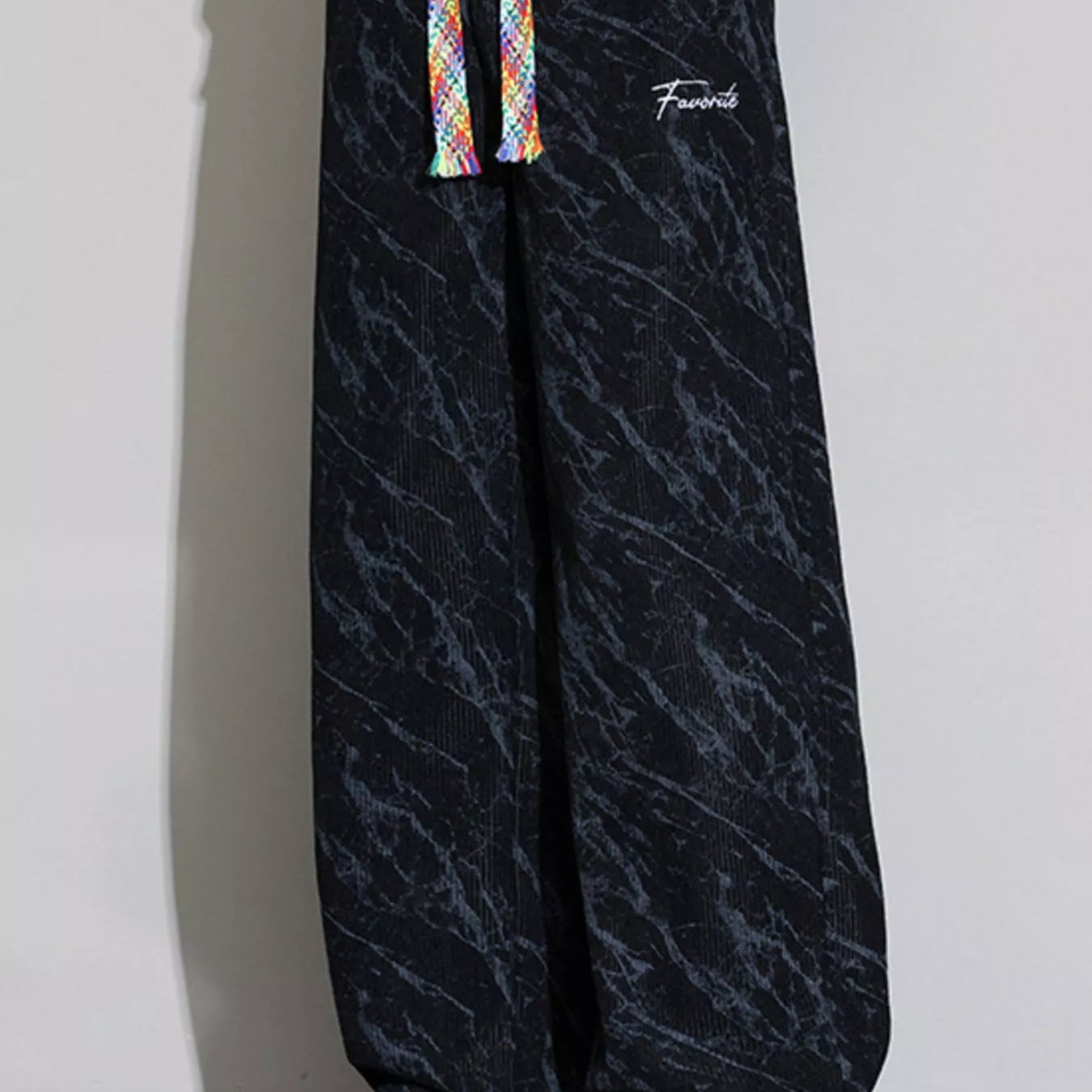 Men's Wide Leg Casual Pants featuring a drawstring design and stylish pattern.