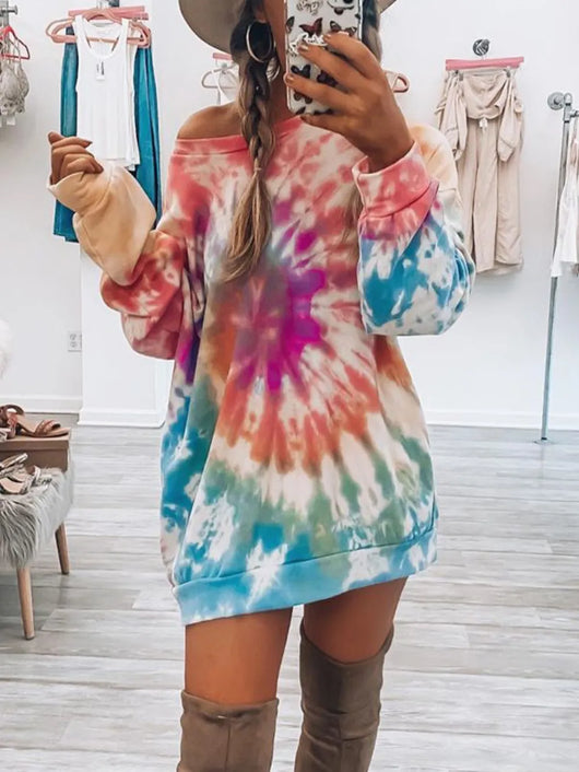 Full Size Tie-Dye Round Neck Long Sleeve Dress in vibrant colors worn with thigh-high boots.