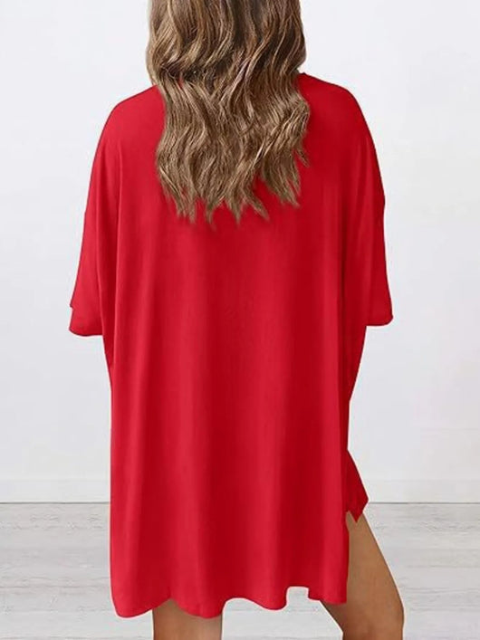 Woman wearing a Full Size Oversized Slit Round Neck Top and Shorts Lounge Set Plus Size in red from the back view.