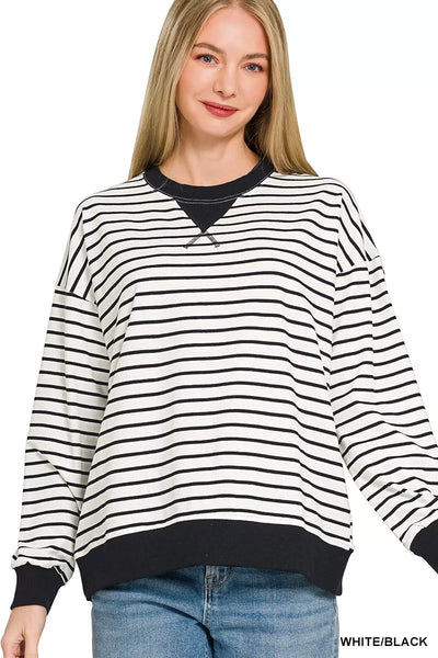 Zenana Contrast Striped Round Neck Sweatshirt in white and black with sporty design and cozy fit.