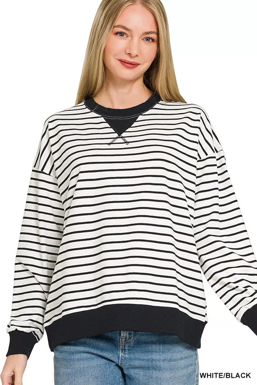 Zenana Contrast Striped Round Neck Sweatshirt in white and black with sporty design and cozy fit.