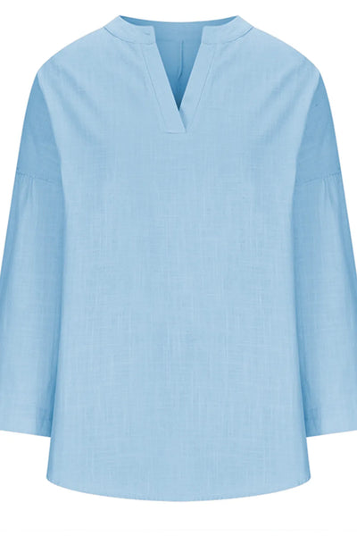 Solid Color Notched Long Sleeve Blouse in light blue color with a simple design and long sleeves.