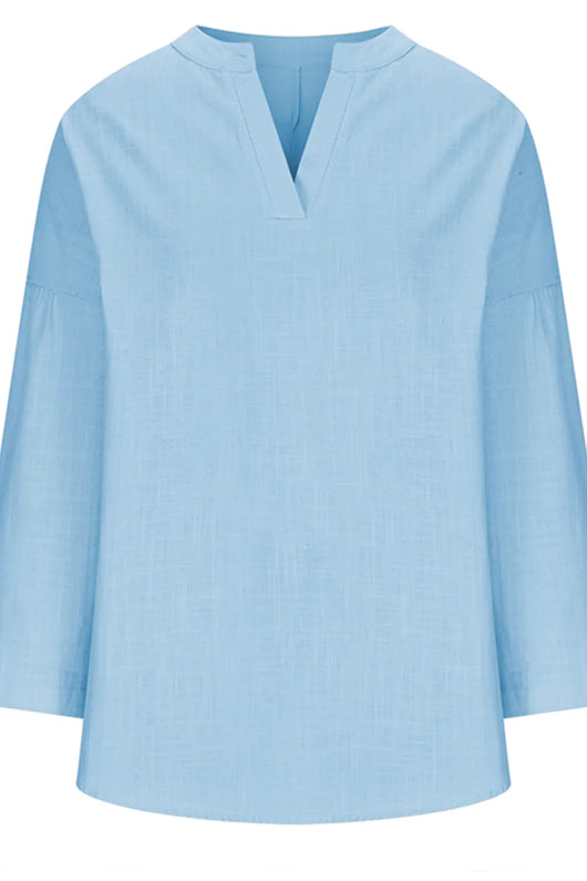 Solid Color Notched Long Sleeve Blouse in light blue color with a simple design and long sleeves.