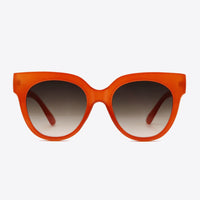 UV400 Polycarbonate Round Sunglasses in bold orange color with gradient lenses.
