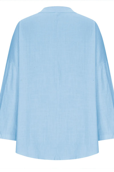 Back view of Solid Color Notched Long Sleeve Blouse in light blue, made from 100% polyester, featuring a basic style.