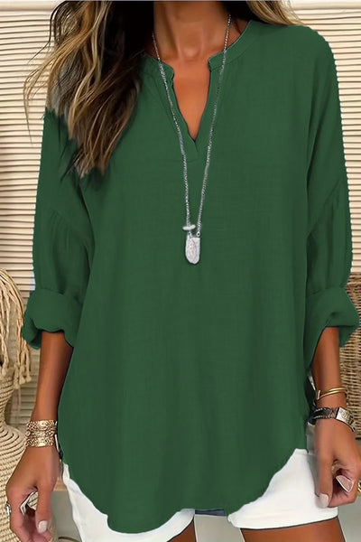 Solid Color Notched Long Sleeve Blouse in dark green with a relaxed fit and rolled sleeves, accessorized with a necklace.