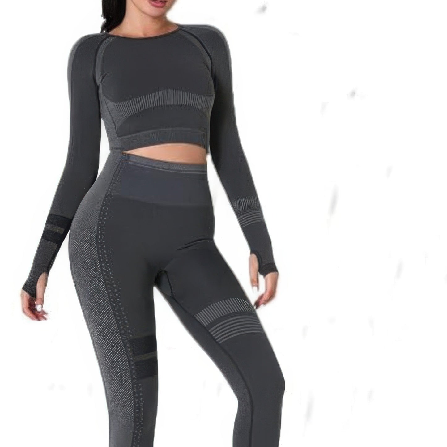 Seamless long sleeve yoga set model wearing a gray crop top and high-waisted leggings for comfort and style.
