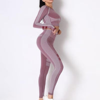 Seamless long sleeve yoga set in a stylish pink design, perfect for workouts and casual wear.