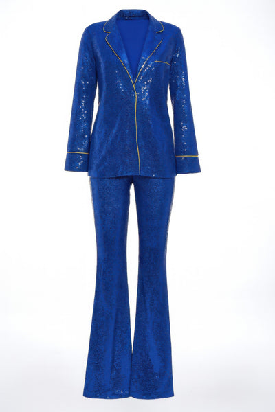 Woman's Resort Wear Pant Set featuring a blue sequined two-piece ensemble with a collared jacket and flared pants.
