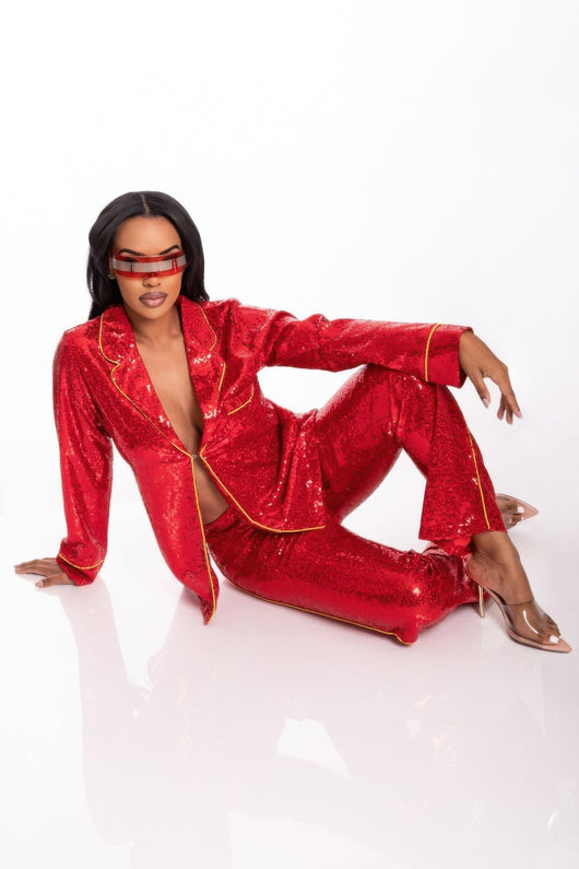 Model wearing Sequin Collared Two Piece Set in red, showcasing modern elegance and a stylish silhouette.