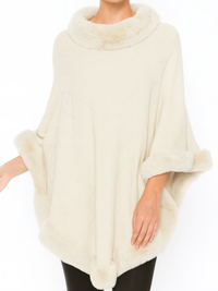 Classic Black Poncho With Faux Fur Trim worn by a model, showcasing its elegant design and soft fabric.