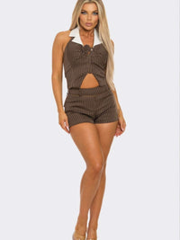 Collared Vest Pleated Skort Set featuring a stylish collar and cut-out detail in a fitted design.