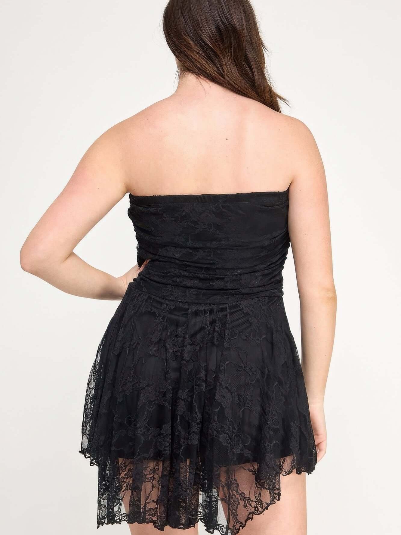 Back view of Plus Size Ots Lace Overlay Assym Dress showcasing the lace detailing and asymmetrical hem.