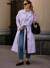 Solid Long Sleeve Trench Coat Woman Lined worn by a stylish woman in a modern urban setting, showcasing elegance and practicality.