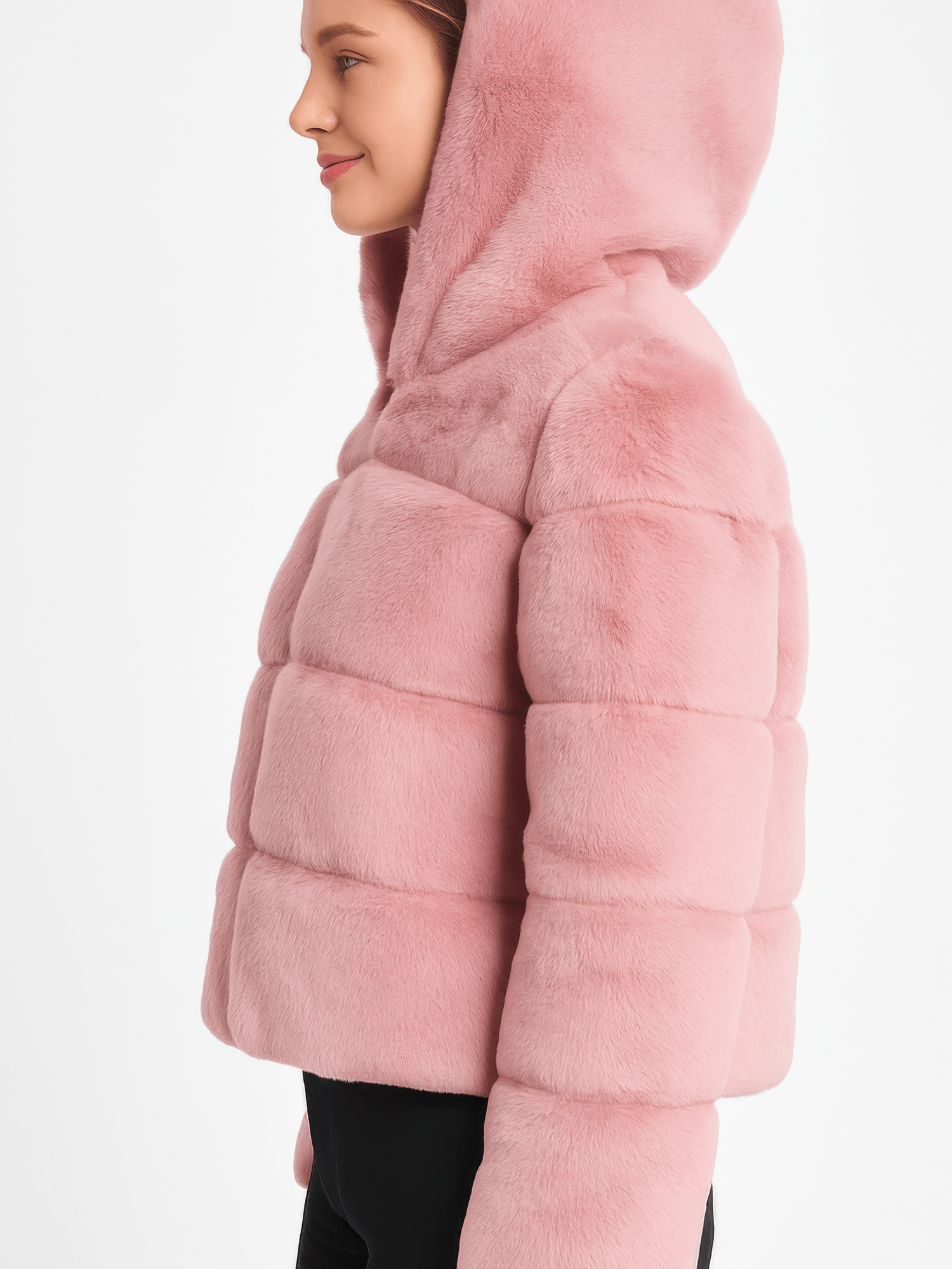 Side view of a woman wearing a pink Faux Fur Hooded Jacket with a plush texture and zip-up front.
