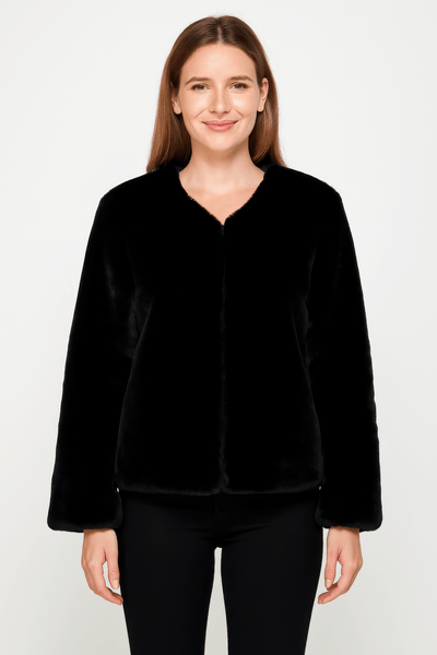 Model wearing a black Faux Fur Trim Cape, showcasing its elegant design and soft texture.