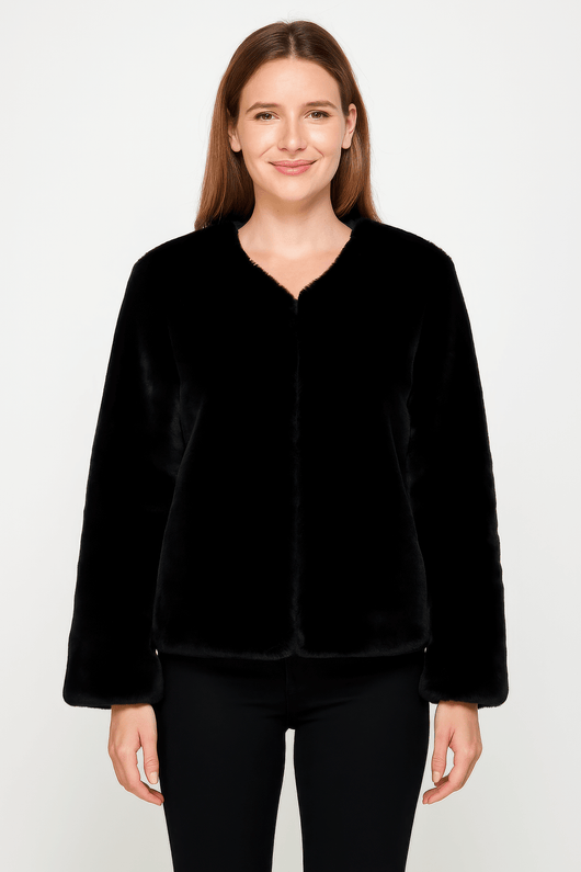 Model wearing a black Faux Fur Trim Cape, showcasing its elegant design and soft texture.