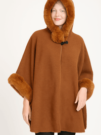 Hooded Faux Fur Trim Cape featuring plush faux fur trim and a cozy hood for winter elegance.