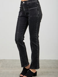 Mid Rise Slim Straight In Black Acid jeans featuring a flattering mid rise and slim straight leg, styled with open toe heels.