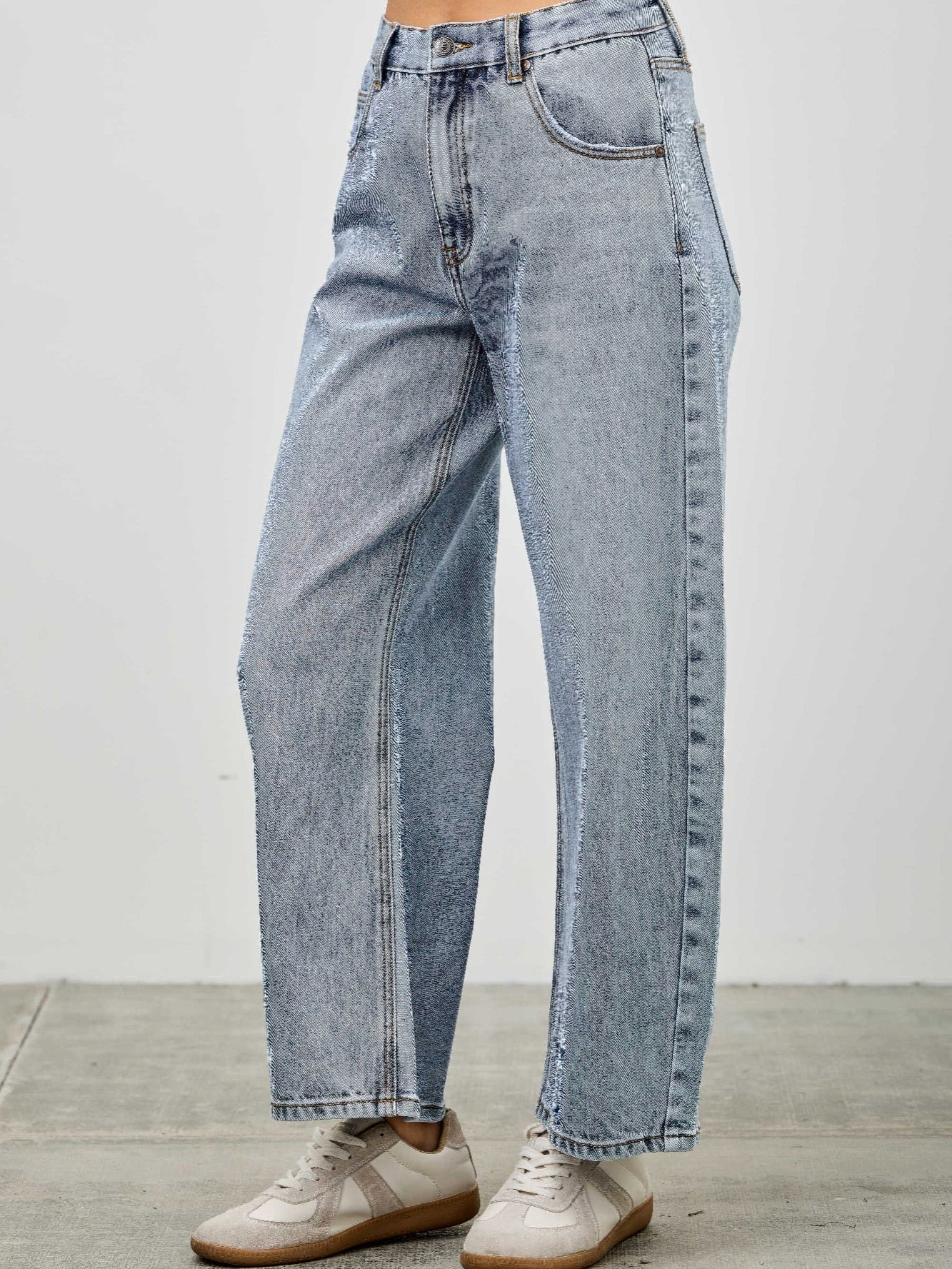 High Rise Low Curve Barrel jeans in light denim with a roomy barrel leg and high-rise waist.