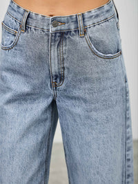 High Rise Low Curve Barrel jeans showcasing a high-rise waist and roomy barrel leg for a modern silhouette.