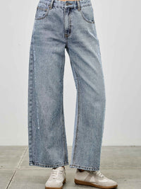 High Rise Low Curve Barrel jeans showcasing a modern silhouette and relaxed barrel leg design.