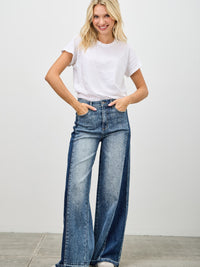 High Rise Wide Leg W/release Hem And Side Contrast styled with a basic white tee for a trendy casual look.