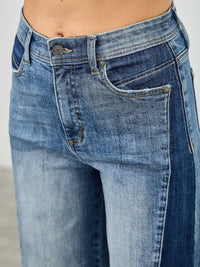 High Rise Wide Leg W/release Hem And Side Contrast showcasing the unique side paneling and raw hem detail.