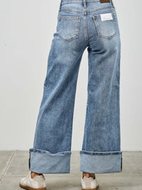 Mid Rise Cuffed Jeans With Stretch viewed from the back, showcasing the cuffed hem and relaxed fit.