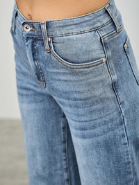 Close-up of Mid Rise Cuffed Jeans With Stretch showcasing a flattering fit and soft denim texture.