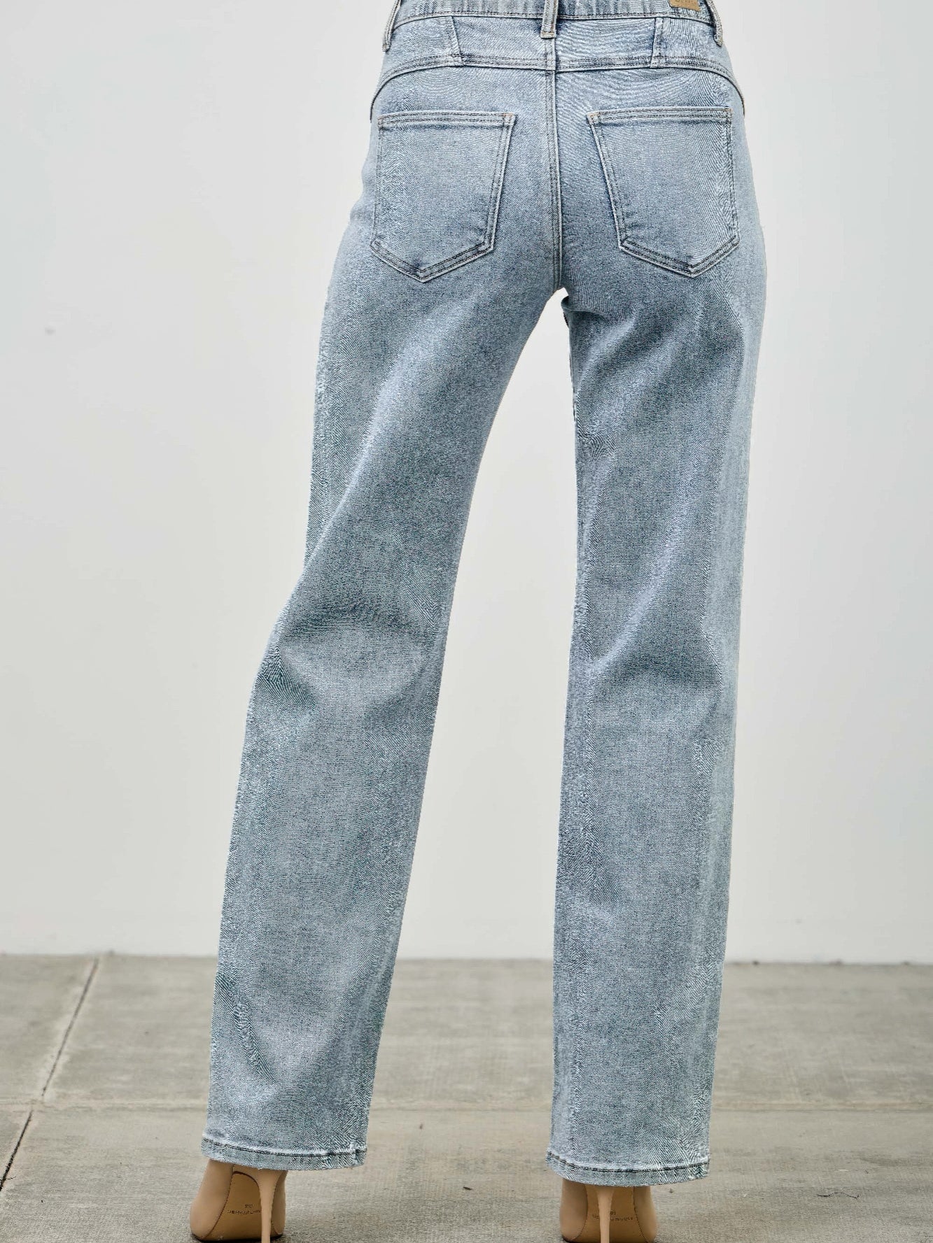 Mid Rise Straight With Piping - Back view of mid rise straight jeans with subtle piping detail.