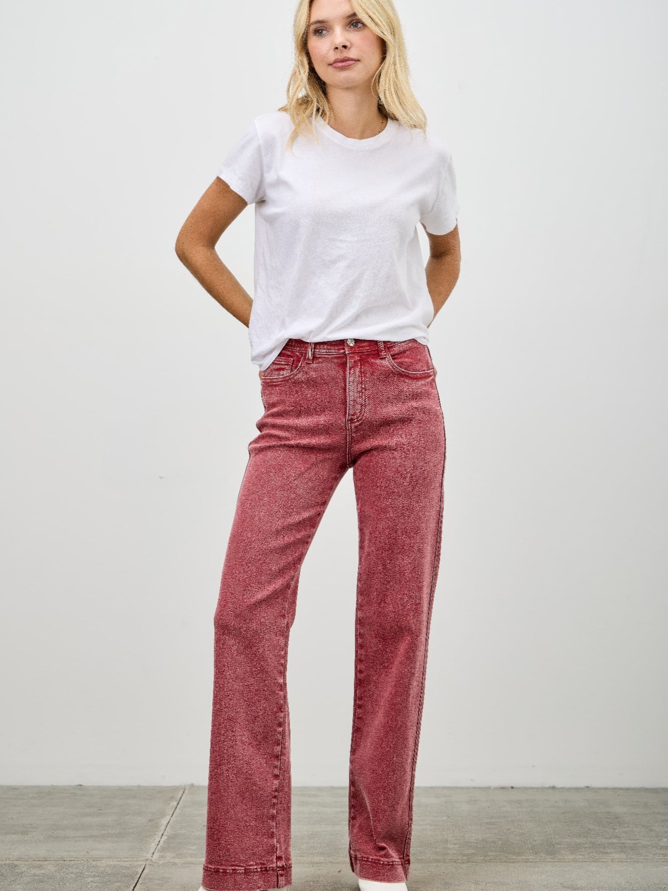 High Rise Slim Wide Straight jeans featuring a flattering high-rise waist and straight leg design.