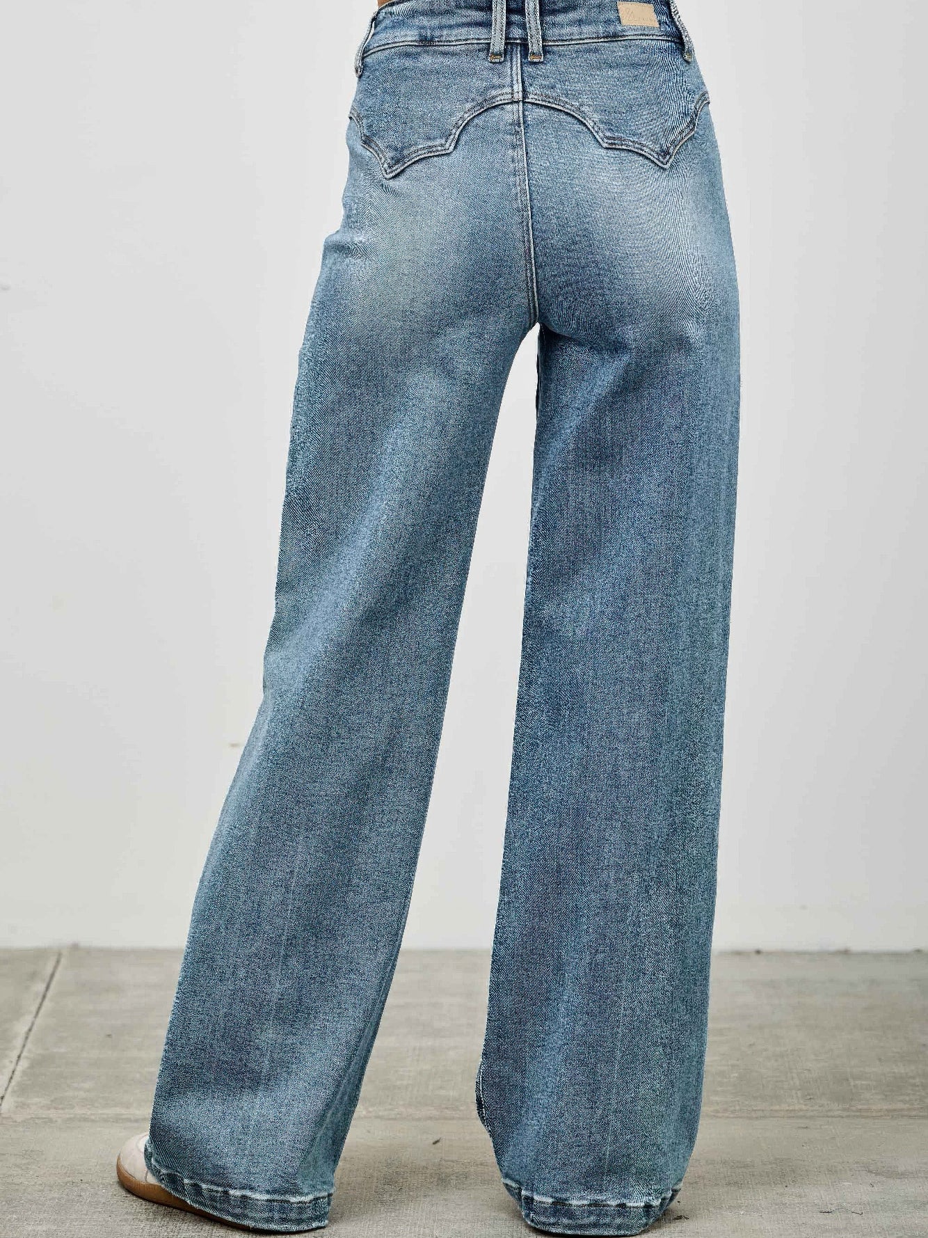 High Rise Double Pocket Wide Leg jeans featuring a back view with a wide leg silhouette.