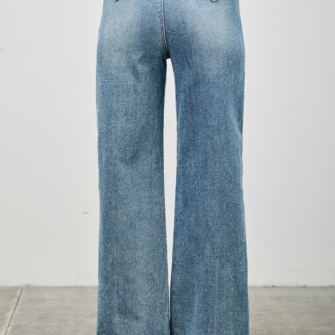 High Rise Double Pocket Wide Leg jeans showcasing a high-rise waist and wide leg silhouette from the back.