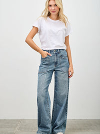 High Rise Double Pocket Wide Leg jeans styled with a casual white t-shirt and relaxed footwear.