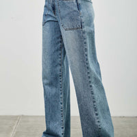 High Rise Double Pocket Wide Leg jeans displayed on model, showcasing a relaxed fit and stylish design.