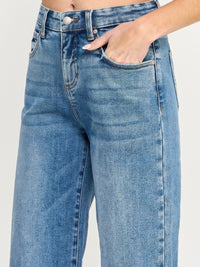 Tummy Control High Rise Crop Wide W/ Released Hem featuring a relaxed fit and high-rise waistband with tummy control.